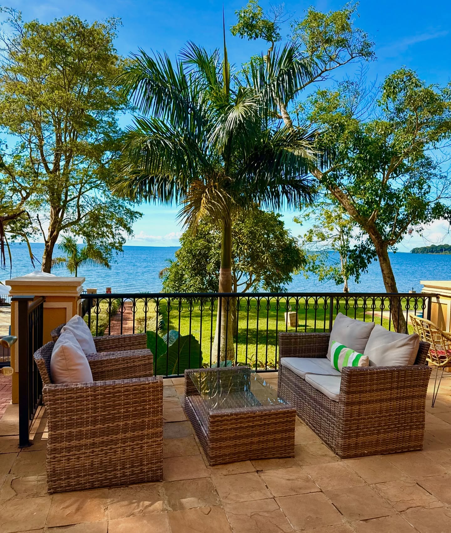 Wicker seating on the terrace looking over Lake Victoria